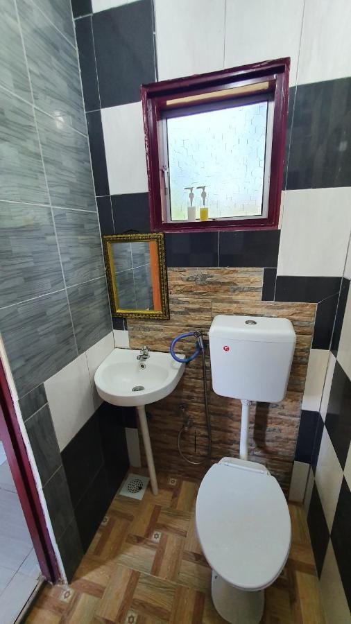 קואלה קנגסאר Chalet Kampong Semawar מראה חיצוני תמונה