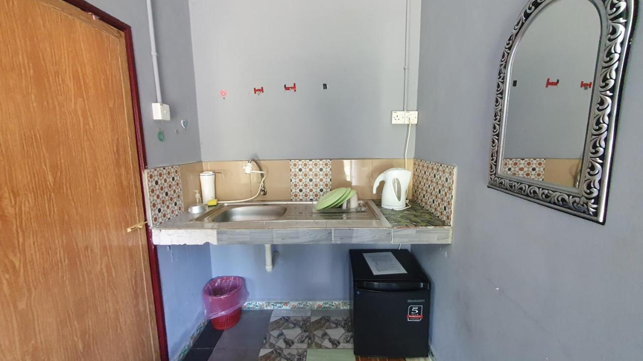 קואלה קנגסאר Chalet Kampong Semawar מראה חיצוני תמונה