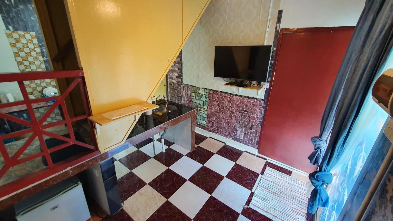 קואלה קנגסאר Chalet Kampong Semawar מראה חיצוני תמונה